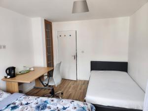 Postel nebo postele na pokoji v ubytování Jey's Flat