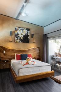 Katil atau katil-katil dalam bilik di Hotel FAREMITI Uvita