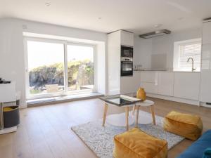 Η κουζίνα ή μικρή κουζίνα στο Beach Cottage +5 φωτογραφίες