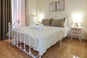 Ένα ή περισσότερα κρεβάτια σε δωμάτιο στο Polixeni`s house