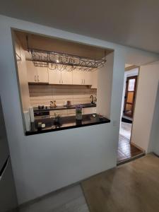 A kitchen or kitchenette at Casa Laura&Florin
