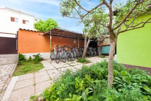 a group of bikes parked outside of a building at Apartments Erik B&B Adults only in Rovinj