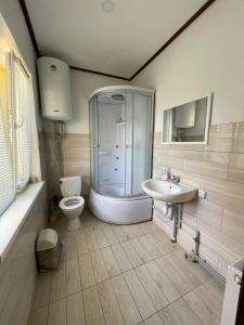 Phòng tắm tại Садиба Карпат