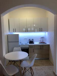 Kuchyň nebo kuchyňský kout v ubytování Apartman Cmiljanic