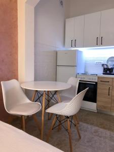 Kuchyň nebo kuchyňský kout v ubytování Apartman Cmiljanic