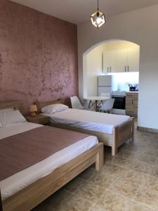 Postel nebo postele na pokoji v ubytování Apartman Cmiljanic