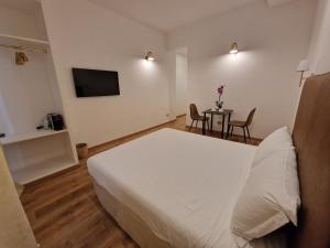 TV a/nebo společenská místnost v ubytování Cuma Suites