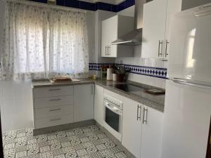 Kuchyňa alebo kuchynka v ubytovaní ESPACIO Y LUZ en Isla Cristina Capacidad hasta 6 HUESPEDES