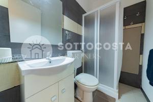 Salle de bains dans l'établissement Surf Flat
