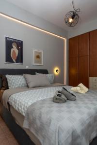 Ένα ή περισσότερα κρεβάτια σε δωμάτιο στο MK lux apartment