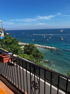 a view of the ocean from a balcony at Casa Vista Mare in Capri