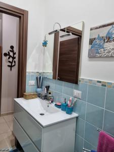 Ванна кімната в Casa Vacanza La Via Del Cinabro