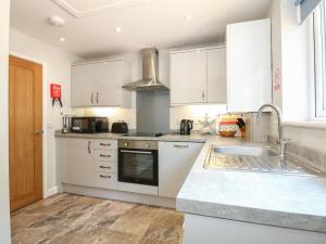 Køkken eller tekøkken på Hadleigh Farm Cottage