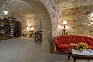A seating area at Klymeni Traditional Homes