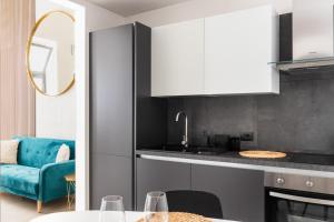 Kuchyň nebo kuchyňský kout v ubytování Lior Apartment