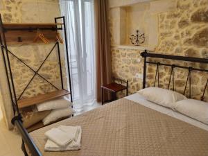 Кровать или кровати в номере Casa dei Maestri