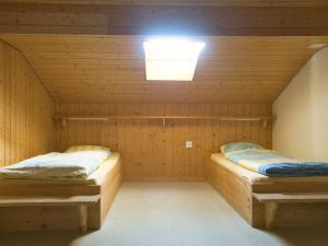 Postel nebo postele na pokoji v ubytování Hotel Aletschhorn