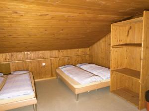 Postel nebo postele na pokoji v ubytování Hotel Aletschhorn