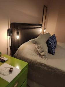 A bed or beds in a room at Melhor ponto de Bonito