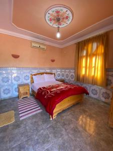 Postel nebo postele na pokoji v ubytování Maroc Galacx
