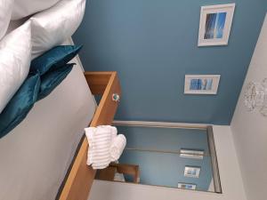 a bedroom with a bunk bed with a mirror at Charming 1-Bed Apartment in Troon in Troon