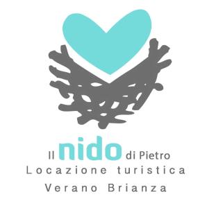 een logo van een vogel in de vorm van een hart bij Il nido di Pietro in Verano Brianza