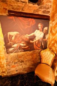 Posezení v ubytování SUITE CARAVAGGIO