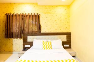 Postel nebo postele na pokoji v ubytování Hotel Elite 59