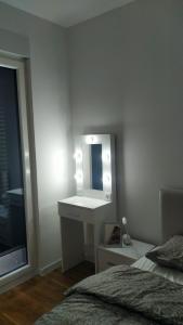 Postel nebo postele na pokoji v ubytování LAGATOR LUX