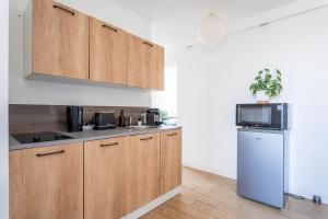 Kuchyň nebo kuchyňský kout v ubytování Appartement T2 GDX Privilège - Bourg en Bresse - Centre Ville & Gare