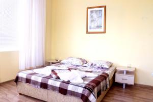 Cama o camas de una habitación en Guest House at Kirova Street