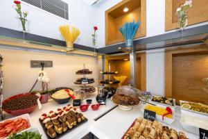 a buffet with many different types of food at Graziella Gold Hotel in Istanbul