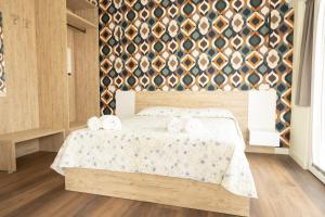 Postel nebo postele na pokoji v ubytování Le fanciulle di Pompei Suites