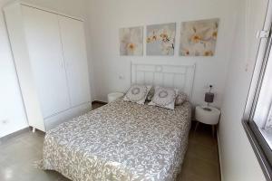 Łóżko lub łóżka w pokoju w obiekcie Dreams - Sueños - Tranquilo con Patio - VUT-PO-006855