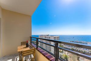 a balcony with a view of the ocean at Prime apartments Club Paraiso Ocean view in Playa Paraiso