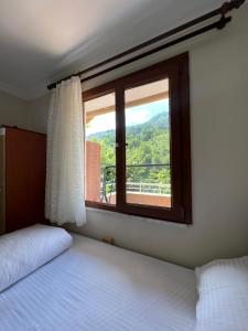 Postel nebo postele na pokoji v ubytování Yeşil Doğa Tatil Apart