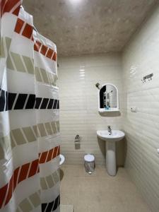 Koupelna v ubytování hOlarooms N2 + 10 fotografií