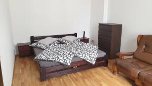 Postel nebo postele na pokoji v ubytování Apartment Karlovy Vary center - T. G. Masaryka
