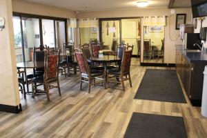 a dining room with a table and chairs at Aero Inn in Kalispell