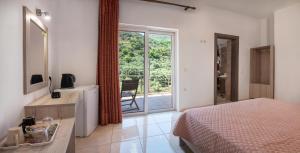 Posteľ alebo postele v izbe v ubytovaní Antartisa B&B