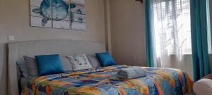 Atlantic Breeze Apartments, Canouan Island客房内的一张或多张床位
