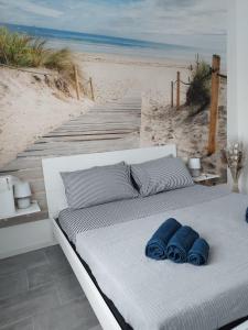Postel nebo postele na pokoji v ubytování b&b Casa Balai 72 a 100 mt dal mare