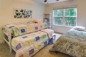a bedroom with two beds and a window at Anderson Lakefront Vacation Rental with Boat Dock! in Anderson