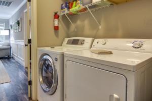 a washer and dryer in a laundry room at Anderson Lakefront Vacation Rental with Boat Dock! in Anderson