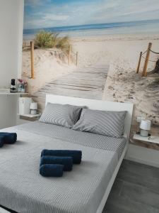 Postel nebo postele na pokoji v ubytování b&b Casa Balai 72 a 100 mt dal mare