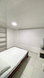 Ένα ή περισσότερα κρεβάτια σε δωμάτιο στο Apartahotel 222 Apartamentos 502