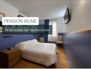 Postel nebo postele na pokoji v ubytování Pensión Irune by Vivere Stays