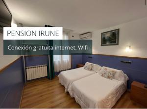 Postel nebo postele na pokoji v ubytování Pensión Irune by Vivere Stays