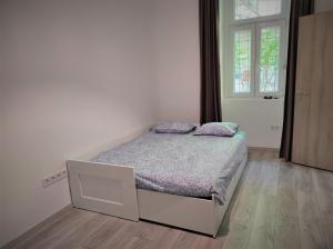 Posteľ alebo postele v izbe v ubytovaní Casina di Tea Budapest