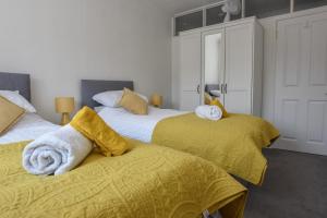 Ένα ή περισσότερα κρεβάτια σε δωμάτιο στο Siesta a spacious family home from home